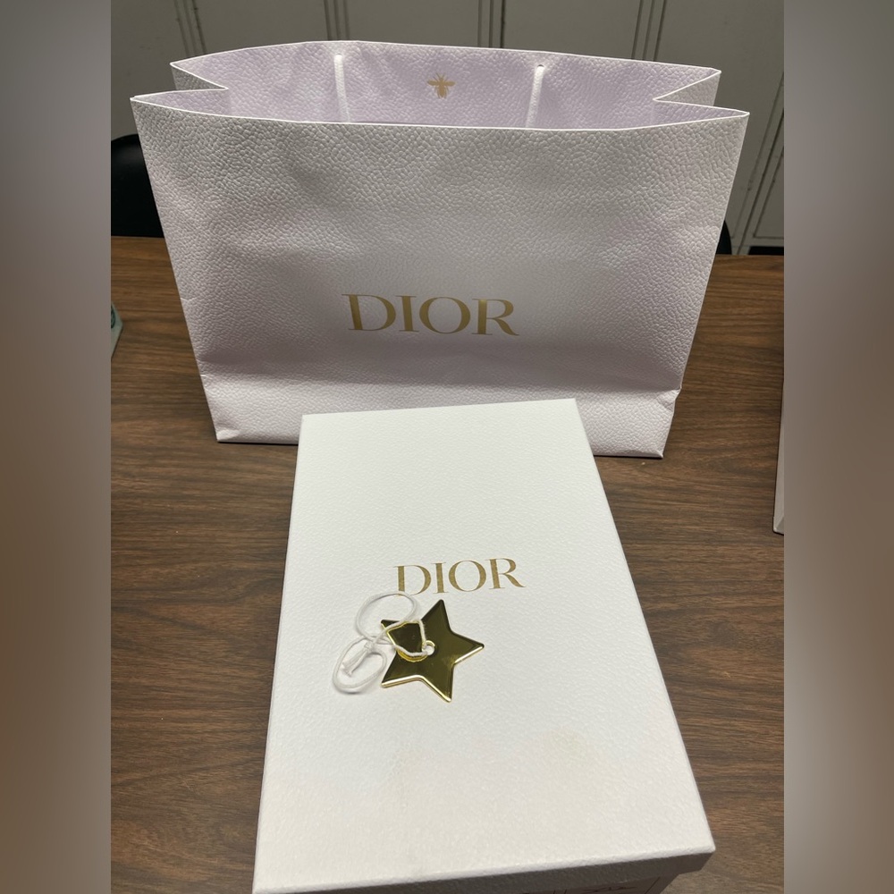 Dior Shiny Gold Star Charm and shopping bag